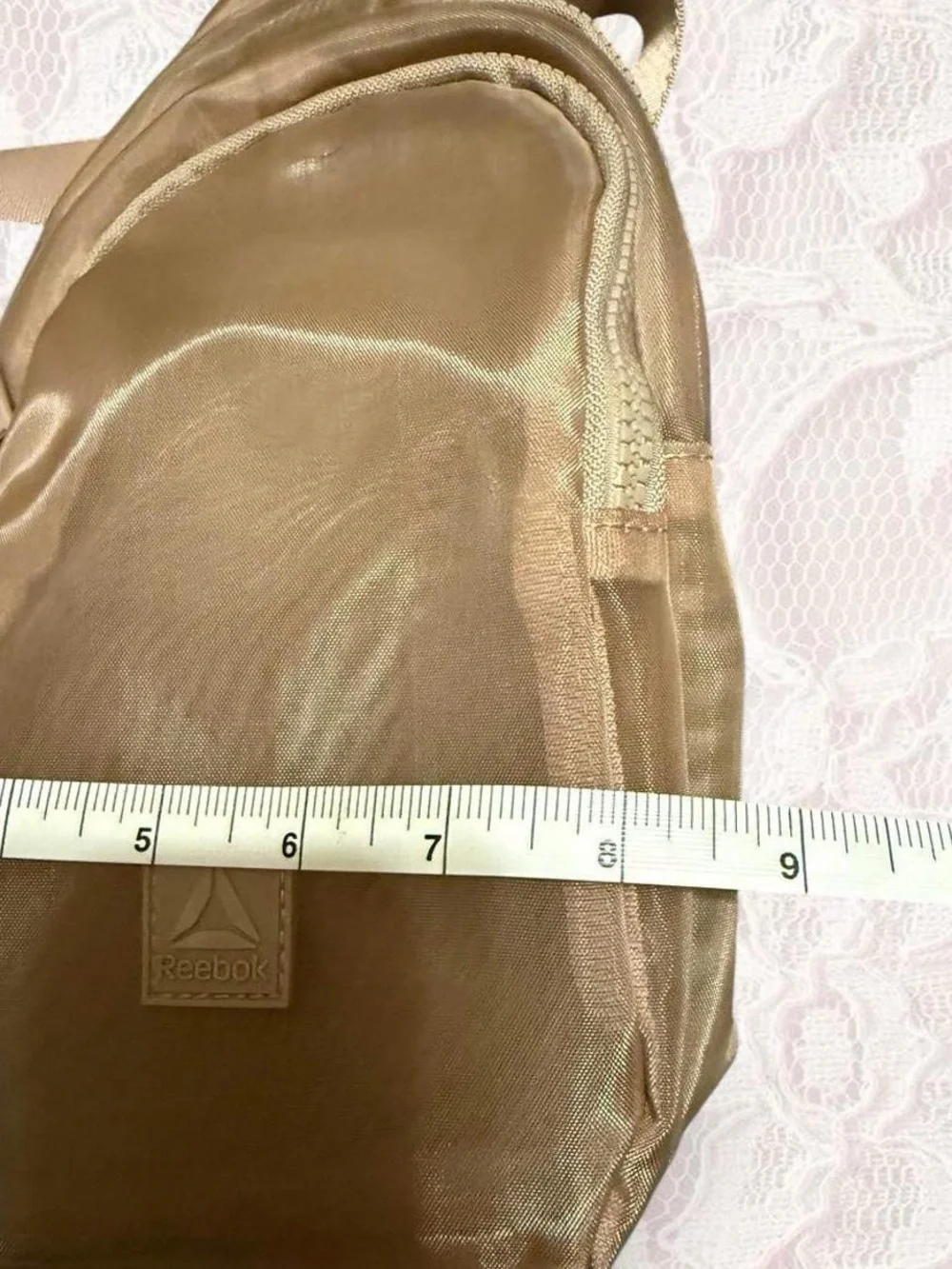 Tan Reebok Mini Sling Backpack